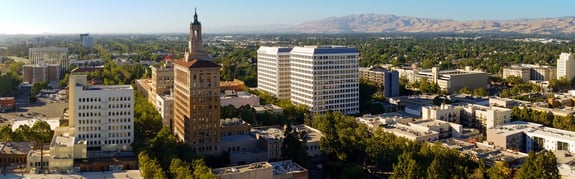 San Jose buildings with mountains in the distance