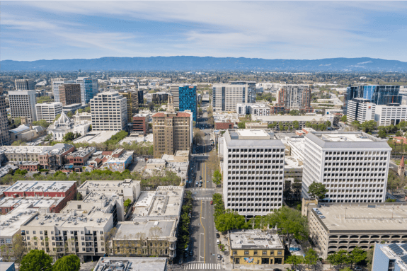 San Jose buildings with mountains in the distance